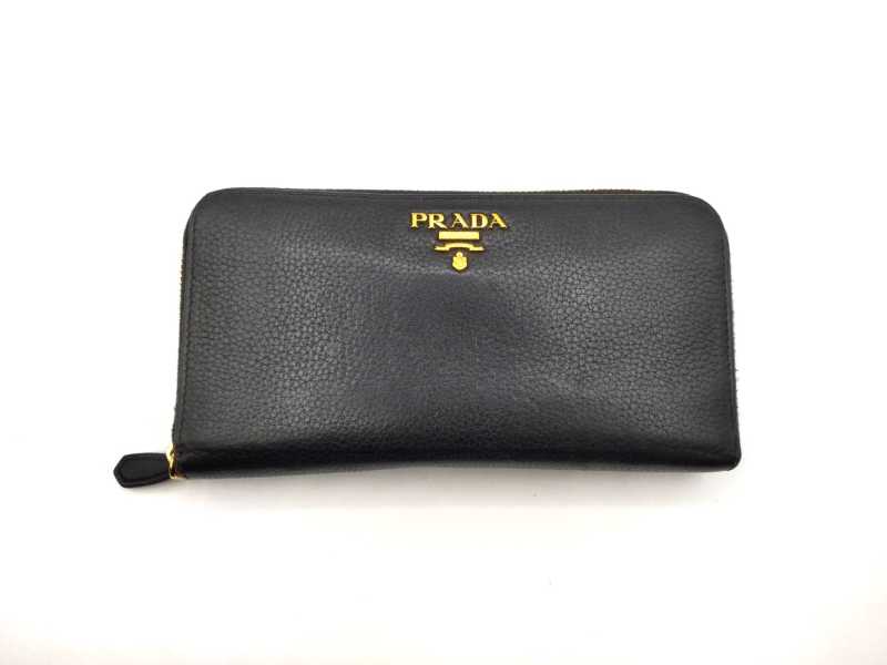 プラダ買取 ラウンドジップ ウォレット 1ML506